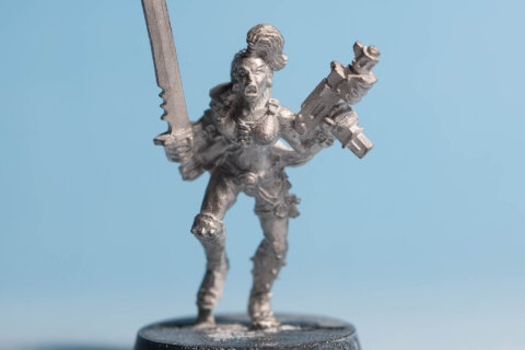 Escher with Autopistol and Sword