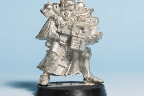 Sister of Battle with Storm Bolter 1